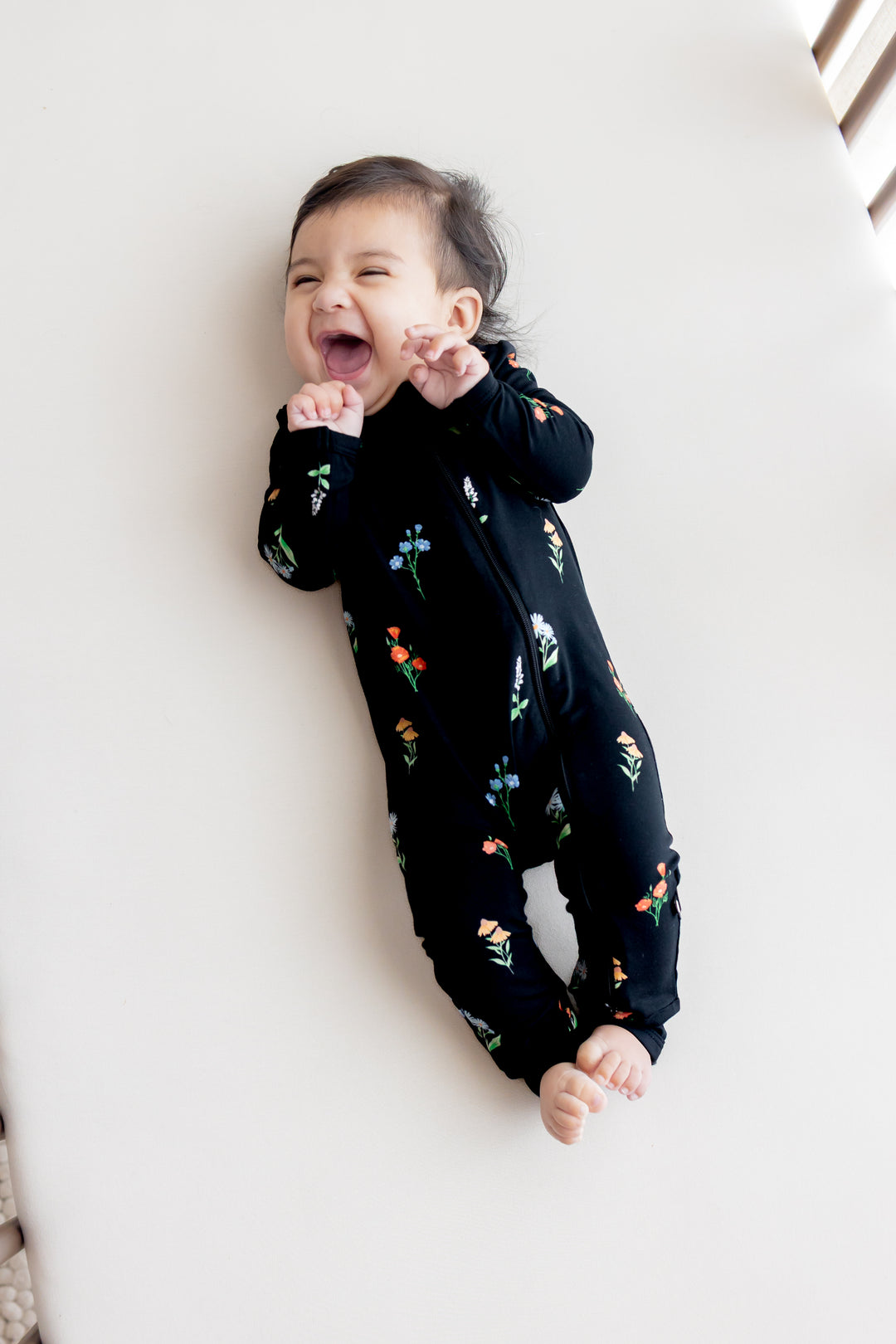 Kyte Baby Long Sleeve Zippered Romper (Midnight Wildflower)