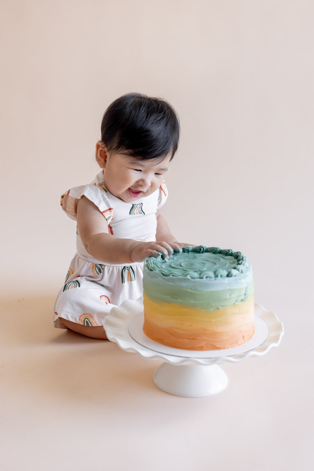 Kyte Baby Twirl Bodysuit Dress (Retro Rainbow)
