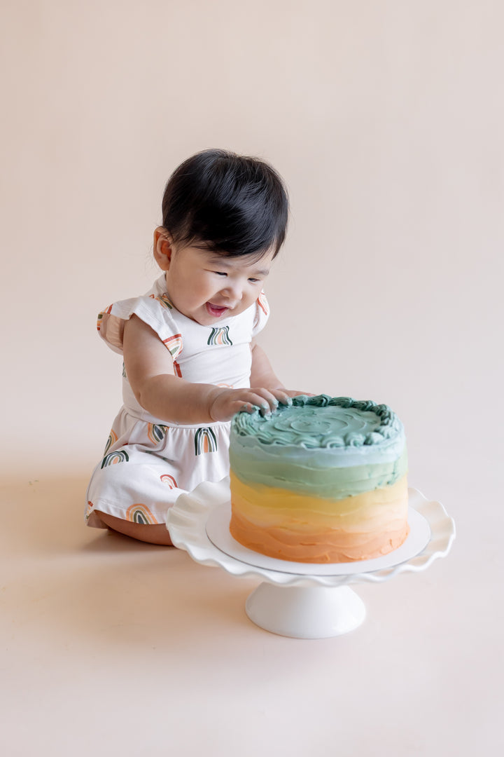 Kyte Baby Twirl Bodysuit Dress (Retro Rainbow)