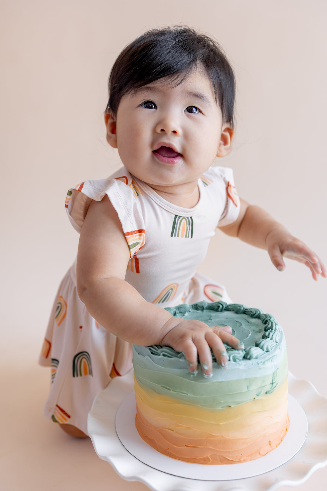 Kyte Baby Twirl Bodysuit Dress (Retro Rainbow)