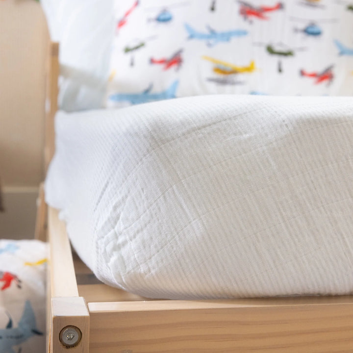 Little Unicorn Cotton Muslin Crib Sheet (Pale Pinstripe)