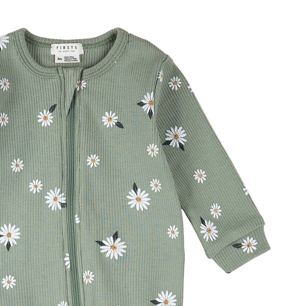 Green baby onesie with daisy pattern on a white background